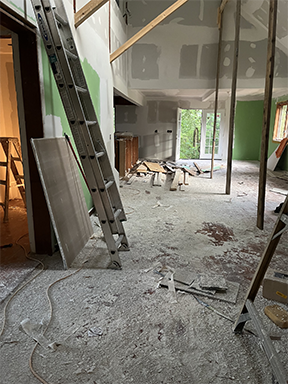 Living and dining area during rough construction